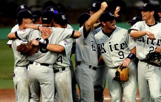 Happy baseball team hugging each other after winning a game - Tendo Sport