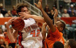 Man basketball players fighting over the ball - Tendo Sport